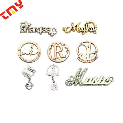 Buy High Quality Custom Mini Letters Metallic Label Accessories Manufacturer Personalized Design Logo Engraved Metal Clothes Tags online manufacture
