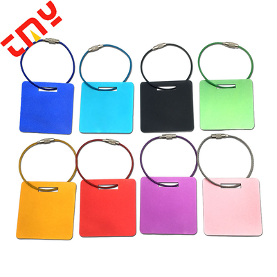 comprar Etiquetas de equipaje de metal de aluminio pulido recubierto de oro Mini grabado con láser logotipo personalizado alambre de acero para bolsas de viaje moderno fabricación en línea